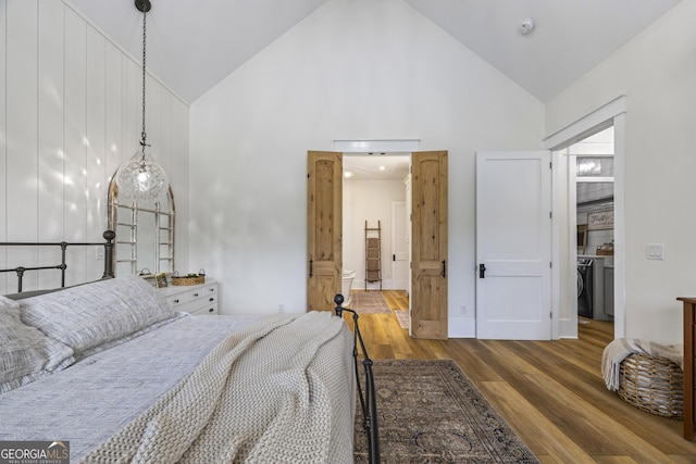 639 Frank Crook Rd, Canon, GA 30520 - bedroom featuring high vaulted ceiling, wood finished floors, independent washer and dryer, and ensuite bathroom