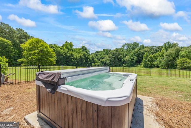 639 Frank Crook Rd, Canon, GA 30520 - view of patio with a hot tub and a wooded view