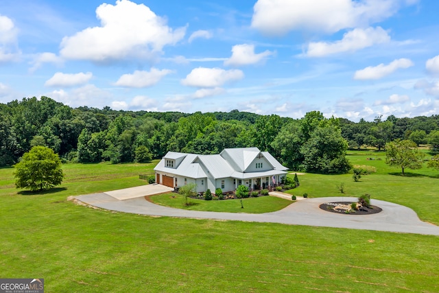 639 Frank Crook Rd, Canon, GA 30520 - view of front of home featuring curved driveway, a front yard, a garage, a porch, and a view of trees