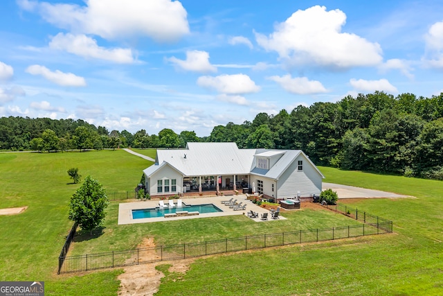 639 Frank Crook Rd, Canon, GA 30520 - rear view of house featuring a patio area, a fenced backyard, a metal roof, and an outdoor hangout area