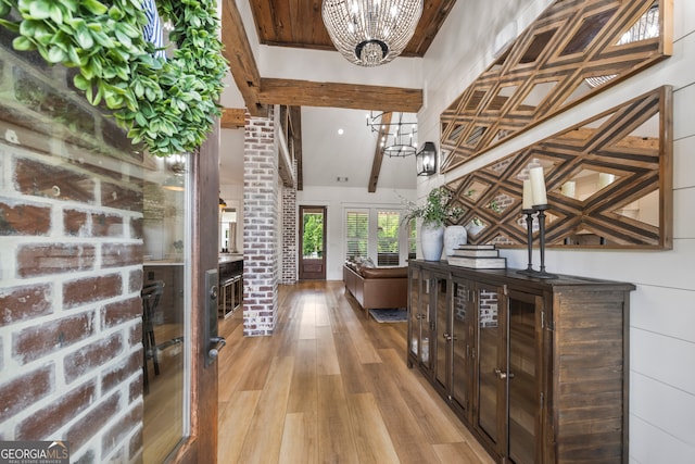 639 Frank Crook Rd, Canon, GA 30520 - entryway with a chandelier, beamed ceiling, and light wood-style flooring