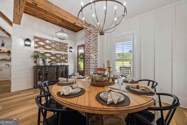 639 Frank Crook Rd, Canon, GA 30520 - dining space featuring a chandelier, light wood finished floors, and a decorative wall