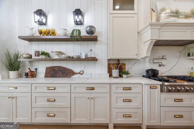 639 Frank Crook Rd, Canon, GA 30520 - kitchen featuring open shelves, backsplash, stainless steel gas stovetop, light stone countertops, and white cabinets