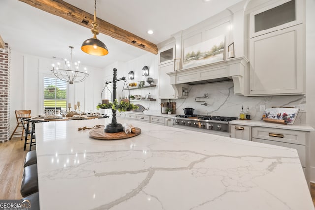 639 Frank Crook Rd, Canon, GA 30520 - kitchen featuring a chandelier, stainless steel gas cooktop, backsplash, light wood finished floors, and beam ceiling