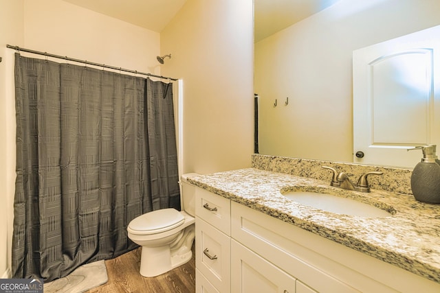 40 Westbrook Rd, Carrollton, GA 30116 - full bath with wood finished floors, vanity, and curtained shower