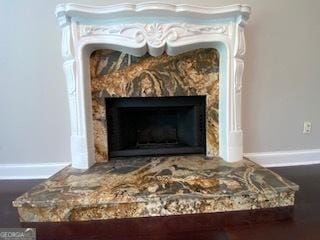 852 Georgetowne Dr, Winder, GA 30680 - detailed view of a fireplace and baseboards