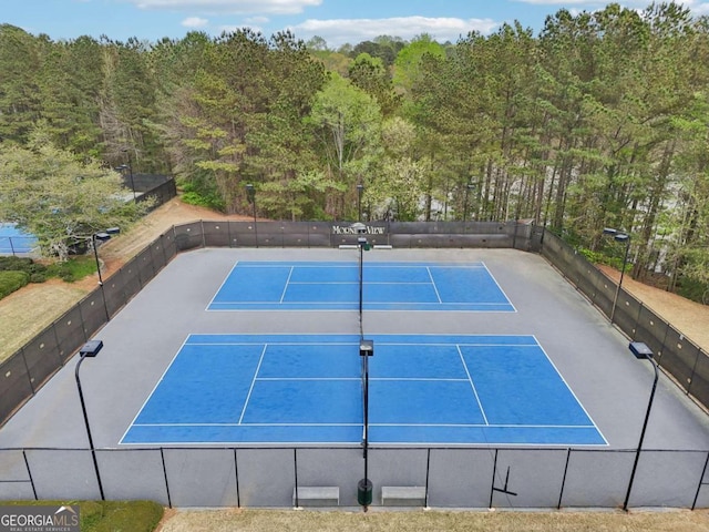 3887 Hickory Manor Dr, Suwanee, GA 30024 - view of tennis court with a view of trees