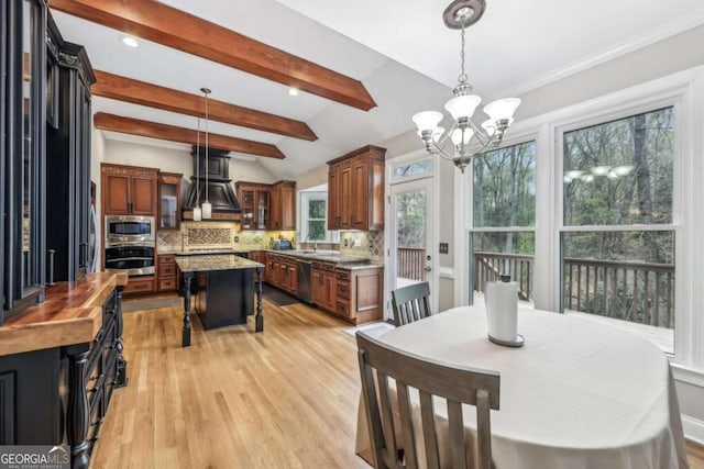3887 Hickory Manor Dr, Suwanee, GA 30024 - dining space featuring a chandelier, light wood-style floors, and recessed lighting