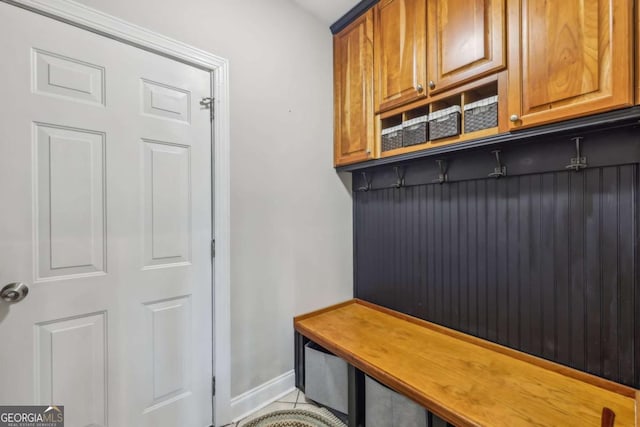 3887 Hickory Manor Dr, Suwanee, GA 30024 - mudroom with baseboards and tile patterned floors