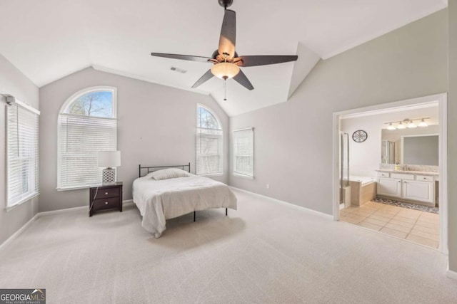 3887 Hickory Manor Dr, Suwanee, GA 30024 - bedroom featuring lofted ceiling, light carpet, a ceiling fan, and ensuite bath