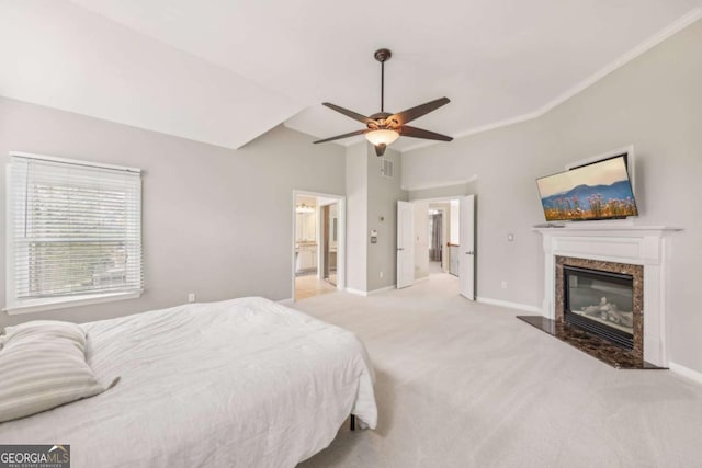 3887 Hickory Manor Dr, Suwanee, GA 30024 - carpeted bedroom with a fireplace, vaulted ceiling, ceiling fan, ensuite bath, and crown molding
