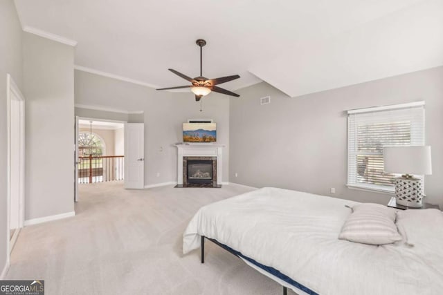 3887 Hickory Manor Dr, Suwanee, GA 30024 - carpeted bedroom featuring a fireplace with flush hearth, ornamental molding, and ceiling fan