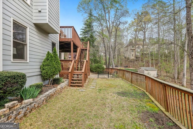 3887 Hickory Manor Dr, Suwanee, GA 30024 - fenced backyard with stairway, a deck, and a shed