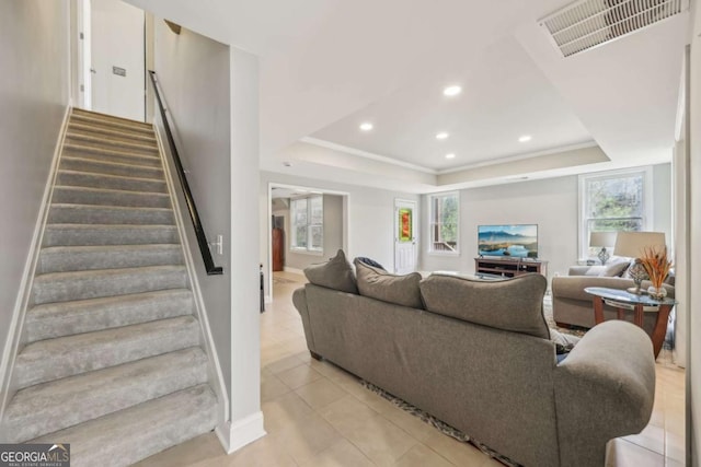 3887 Hickory Manor Dr, Suwanee, GA 30024 - living area featuring a raised ceiling, healthy amount of natural light, stairs, and recessed lighting