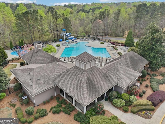 3887 Hickory Manor Dr, Suwanee, GA 30024 - view of subject property with a pool and a forest