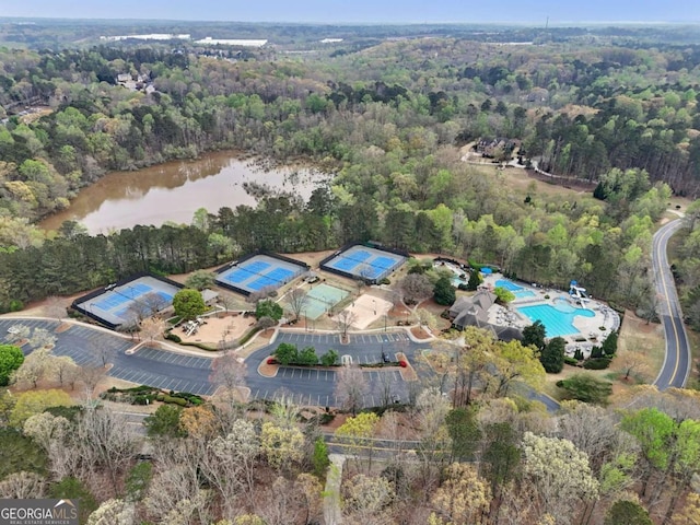 3887 Hickory Manor Dr, Suwanee, GA 30024 - aerial view of property and surrounding area featuring a pool and a large body of water