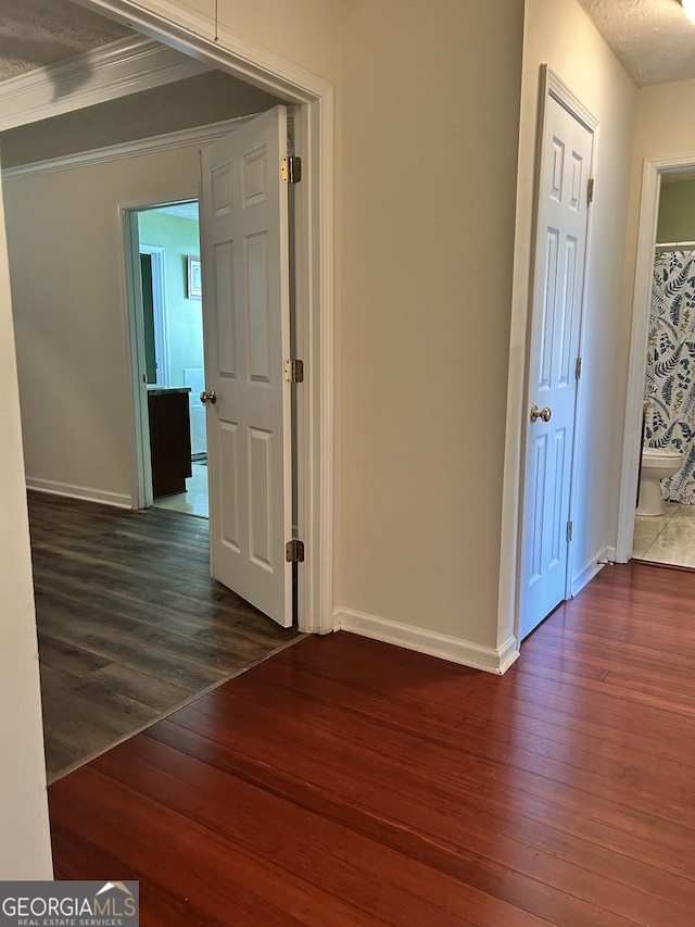375 Sapphire Bnd, Riverdale, GA 30296 - hallway featuring wood finished floors and crown molding
