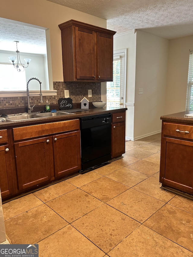 375 Sapphire Bnd, Riverdale, GA 30296 - kitchen featuring dishwasher, dark countertops, tasteful backsplash, a textured ceiling, and light tile patterned flooring