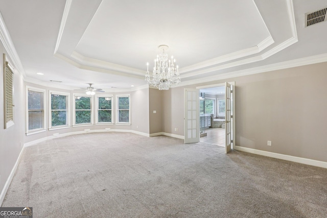 4685 Braselton Hwy, Hoschton, GA 30548 - unfurnished room with a raised ceiling, crown molding, a chandelier, light carpet, and a ceiling fan