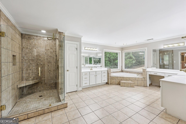 4685 Braselton Hwy, Hoschton, GA 30548 - bathroom featuring crown molding, vanity, a garden tub, a shower stall, and tile patterned floors