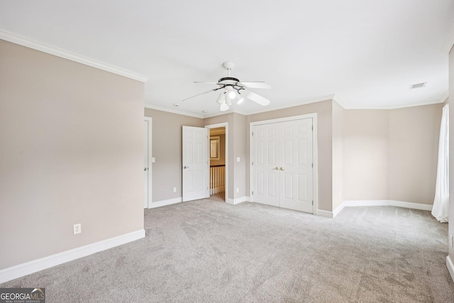 4685 Braselton Hwy, Hoschton, GA 30548 - unfurnished bedroom featuring carpet, ornamental molding, ceiling fan, and a closet