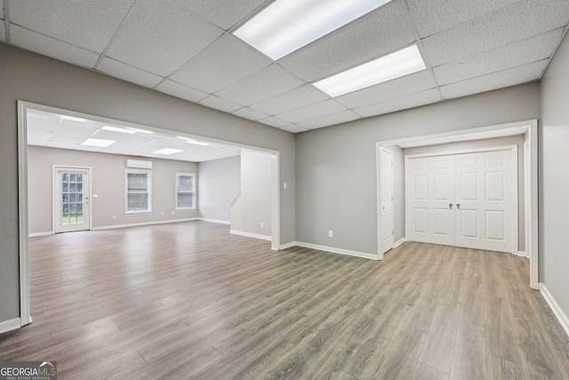 4685 Braselton Hwy, Hoschton, GA 30548 - unfurnished living room with wood finished floors and a drop ceiling