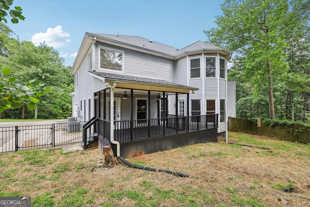 4685 Braselton Hwy, Hoschton, GA 30548 - back of property featuring ceiling fan and a fenced backyard