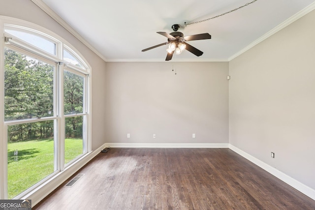 4685 Braselton Hwy, Hoschton, GA 30548 - spare room with dark wood-style flooring, a ceiling fan, and ornamental molding