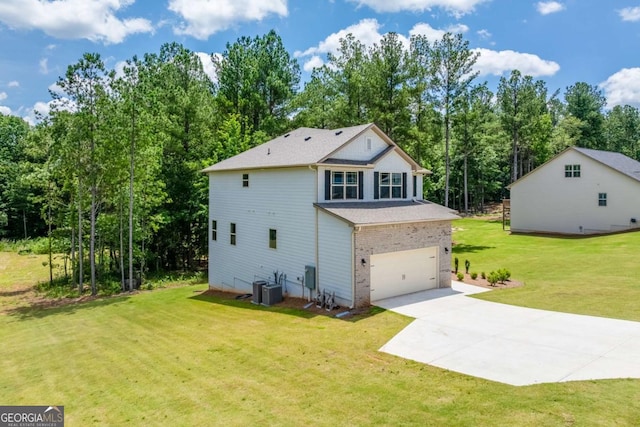 191 Eagle Heights Dr, Maysville, GA 30558 - view of side of property with an attached garage, concrete driveway, a yard, view of scattered trees, and brick siding