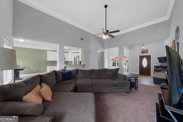79 Hampton Hills Ln, Cleveland, GA 30528 - living room featuring a high ceiling, ceiling fan, and crown molding