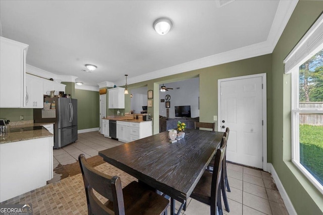 79 Hampton Hills Ln, Cleveland, GA 30528 - dining space with light tile patterned flooring, ornamental molding, and a ceiling fan