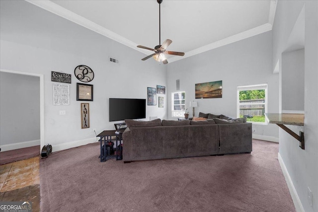 79 Hampton Hills Ln, Cleveland, GA 30528 - carpeted living area featuring a towering ceiling, a ceiling fan, and crown molding