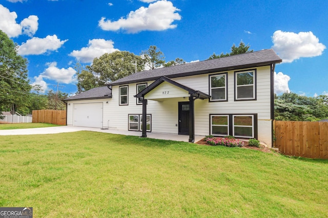 932 Brian Ln, Forest Park, GA 30297 - raised ranch featuring concrete driveway and a garage