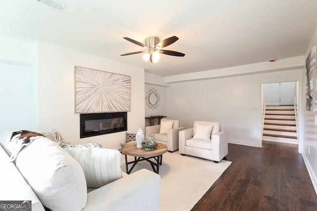 932 Brian Ln, Forest Park, GA 30297 - living room featuring stairway, ceiling fan, hardwood / wood-style floors, and a glass covered fireplace