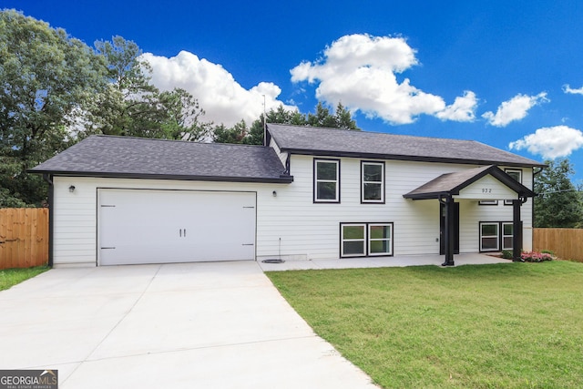 932 Brian Ln, Forest Park, GA 30297 - view of front of property with driveway, an attached garage, and a shingled roof