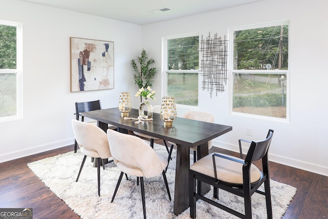 932 Brian Ln, Forest Park, GA 30297 - dining area with dark wood-type flooring