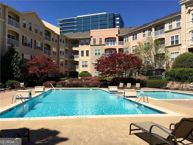 10 Perimeter Summit Blvd NE Unit 3105, Atlanta, GA 30319 - community pool with a patio area