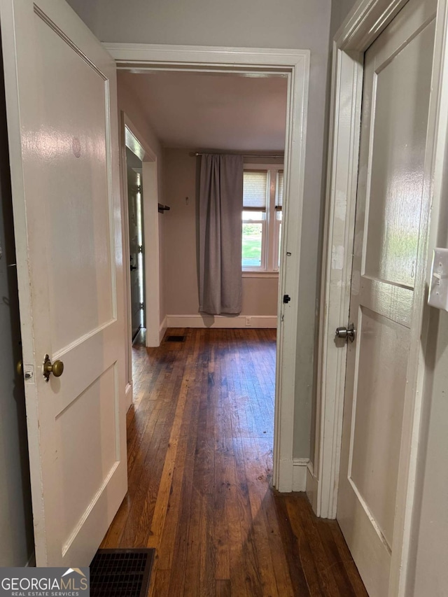 520 Holman Ave, Athens, GA 30606 - hallway featuring dark wood finished floors and baseboards