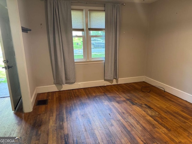 520 Holman Ave, Athens, GA 30606 - unfurnished room featuring hardwood / wood-style floors and baseboards