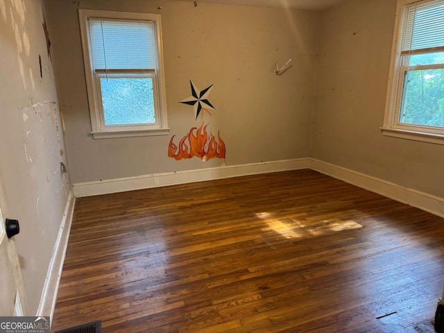 520 Holman Ave, Athens, GA 30606 - unfurnished room featuring hardwood / wood-style floors and baseboards