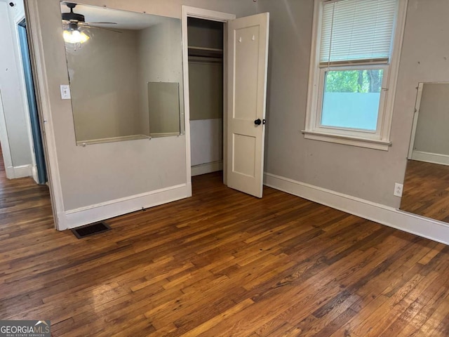 520 Holman Ave, Athens, GA 30606 - unfurnished bedroom with wood finished floors and a closet