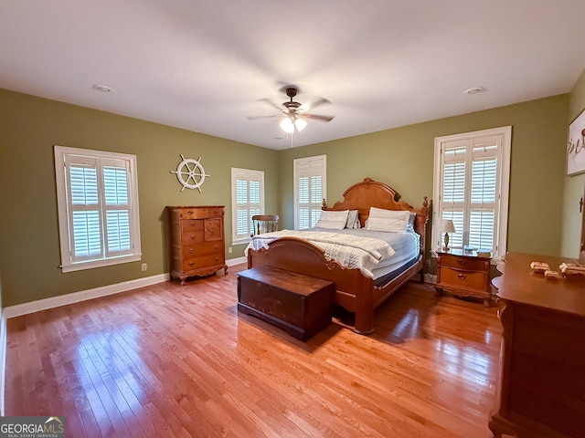 1940 Horne Rd, Eastman, GA 31023 - bedroom featuring multiple windows, light wood-style flooring, and a ceiling fan