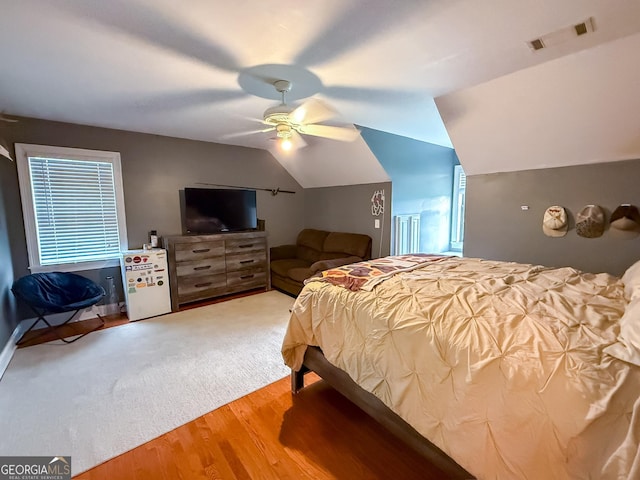 1940 Horne Rd, Eastman, GA 31023 - bedroom featuring light wood-style flooring, vaulted ceiling, and a ceiling fan