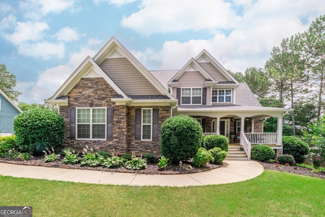 53 Denny Ln, Dallas, GA 30157 - craftsman house with stone siding, covered porch, and a front lawn