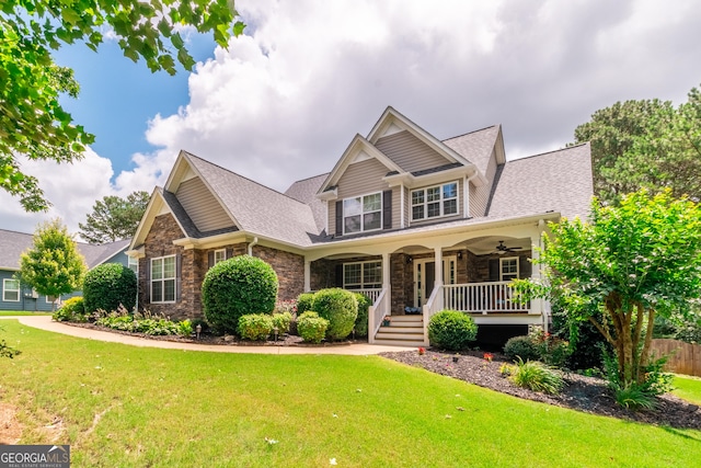 53 Denny Ln, Dallas, GA 30157 - craftsman-style home featuring stone siding, a front yard, a porch, and a ceiling fan