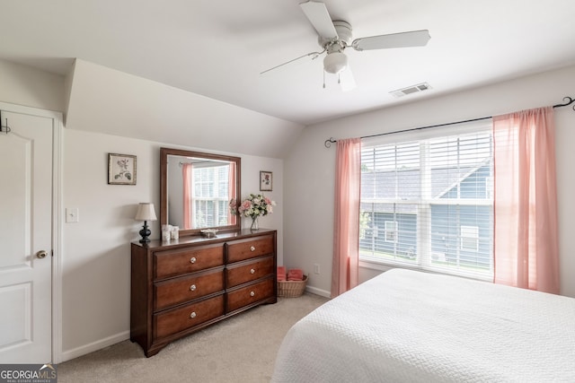 53 Denny Ln, Dallas, GA 30157 - bedroom with multiple windows, lofted ceiling, light colored carpet, and a ceiling fan