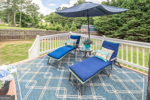 53 Denny Ln, Dallas, GA 30157 - view of patio featuring a storage unit and a wooden deck