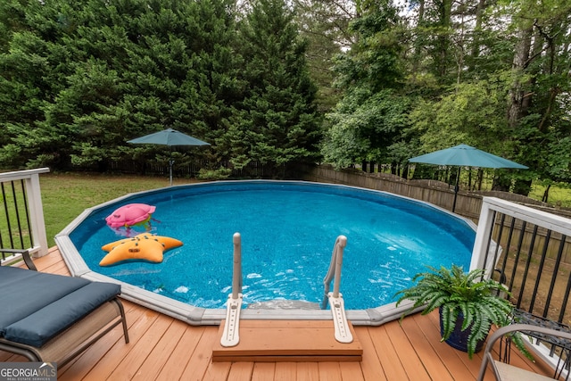 53 Denny Ln, Dallas, GA 30157 - view of swimming pool featuring a deck and a fenced backyard