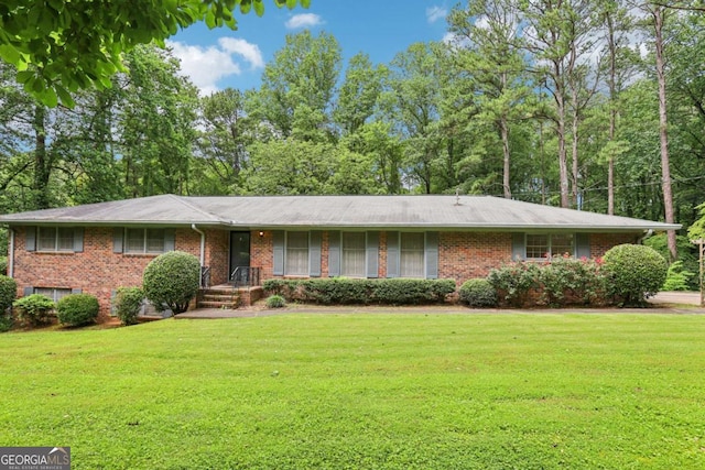 415 Haven Ln, Marietta, GA 30066 - view of front of property with a front yard and brick siding