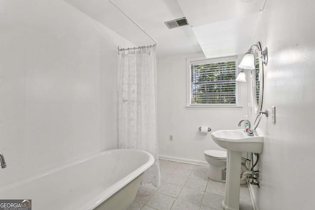415 Haven Ln, Marietta, GA 30066 - full bath featuring a freestanding tub and tile patterned floors